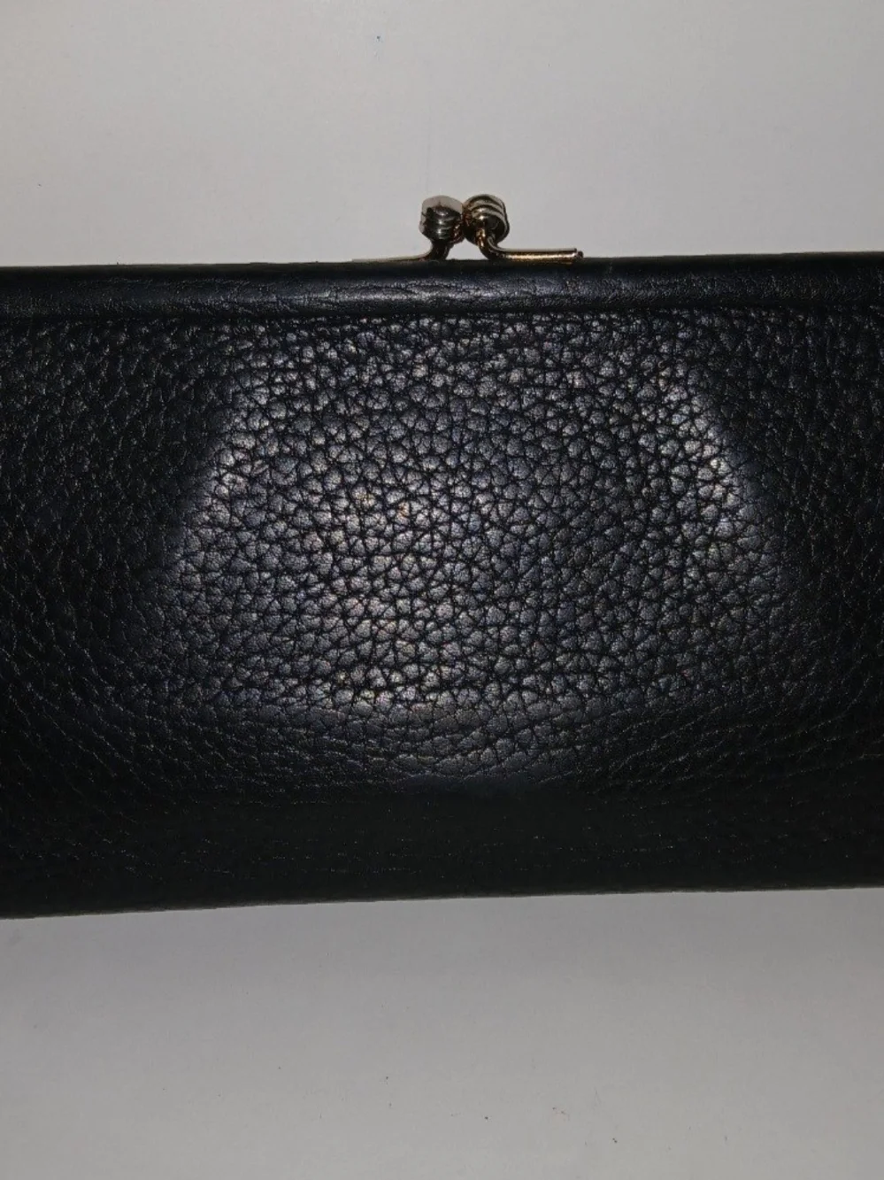 The Dooney & Bourke Black Brown Leather Kisslock Framed Credit Card Trifold